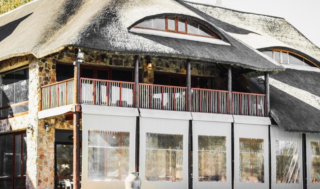 Outside view of optional outside seating at restaurant area at Aquila Game Reserve